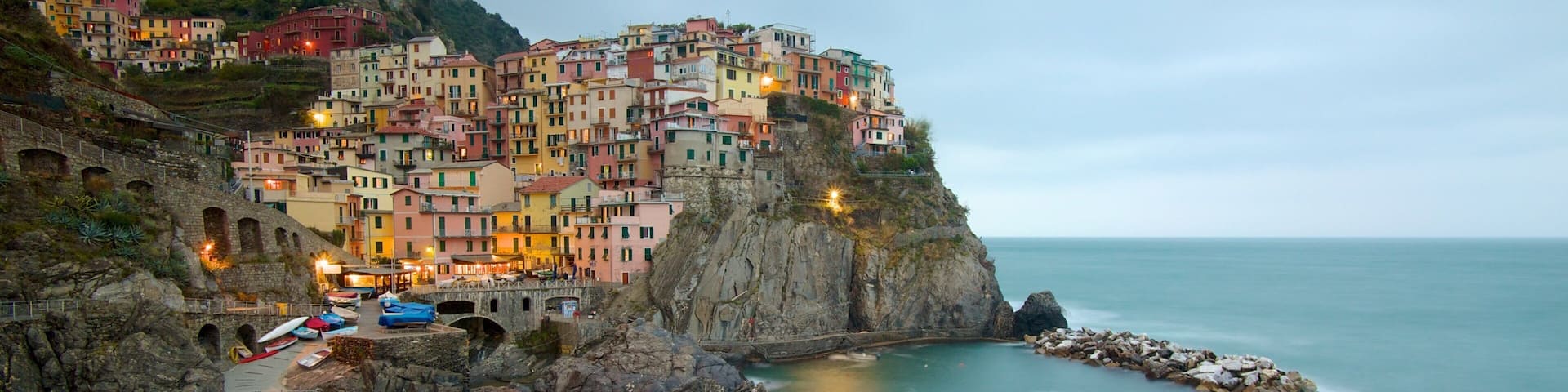 Manarola showing rugged coastline, night scenes and a coastal town