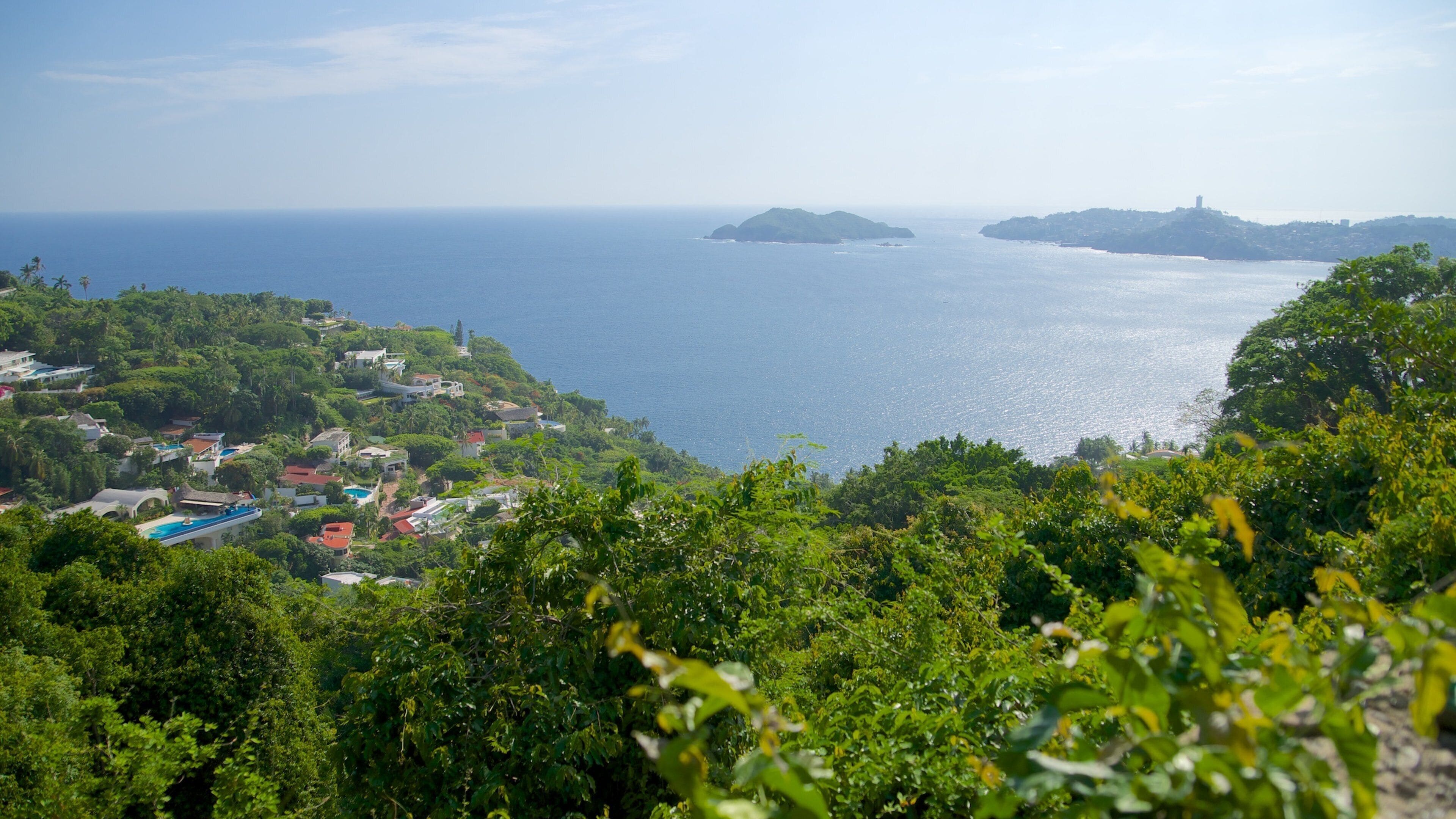 Acapulco which includes a coastal town, landscape views and general coastal views