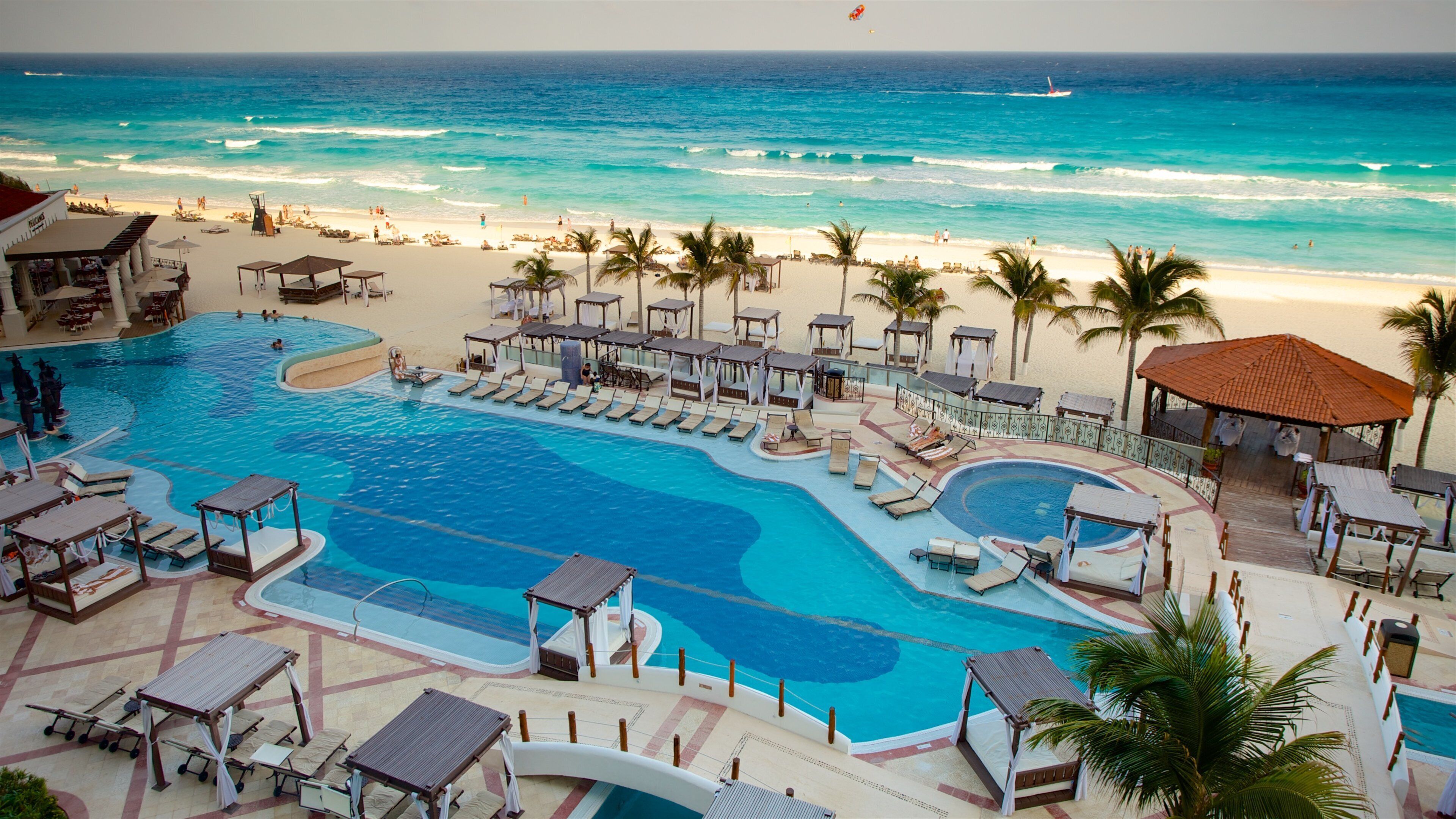 Cancun showing general coastal views, a pool and tropical scenes