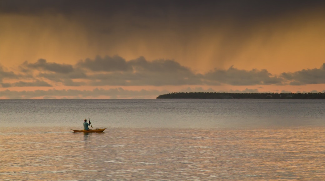 Tonga which includes kayaking or canoeing, a sunset and general coastal views