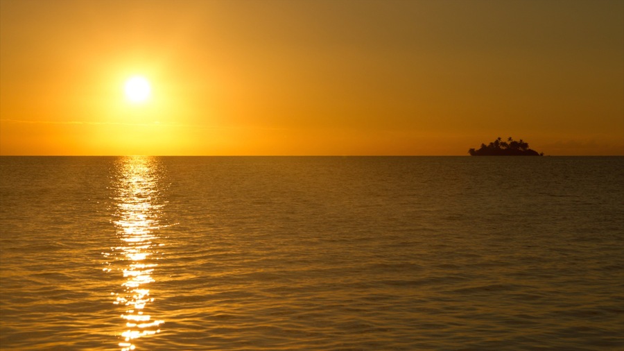 Tonga showing general coastal views and a sunset