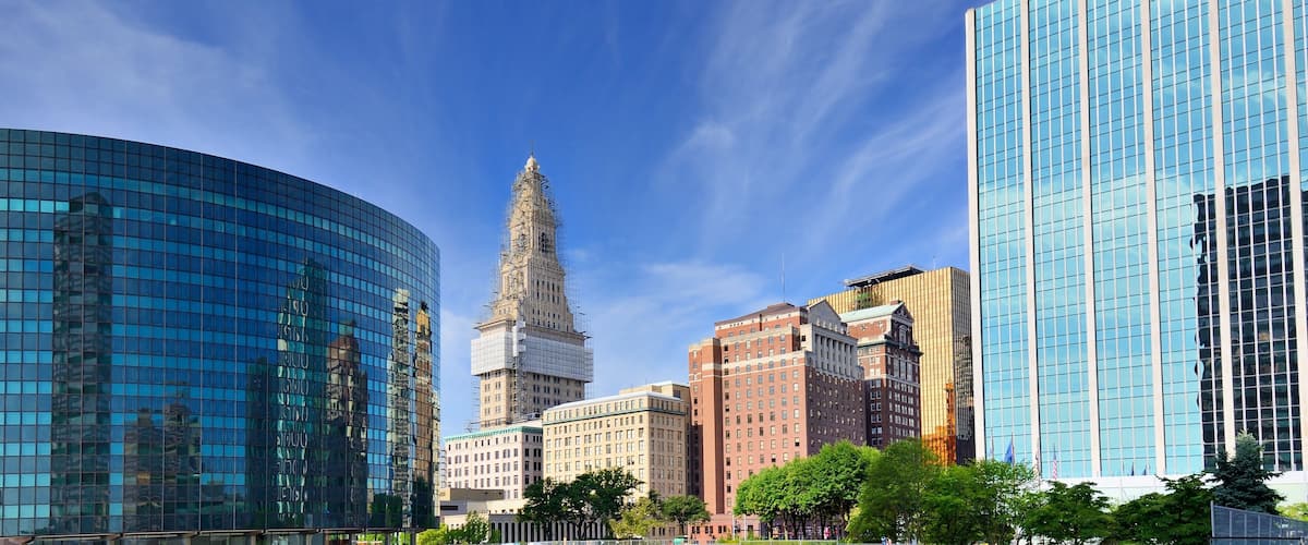 The skyline of downtown Hartford, Connecticut at dusk from across the Connecticut River.