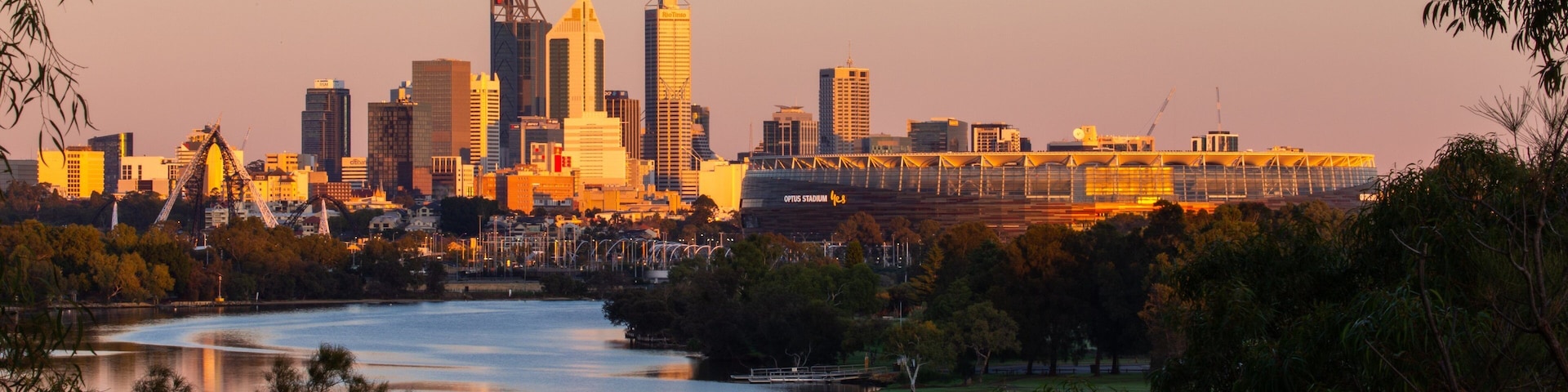 Perth showing a city, a sunset and a river or creek