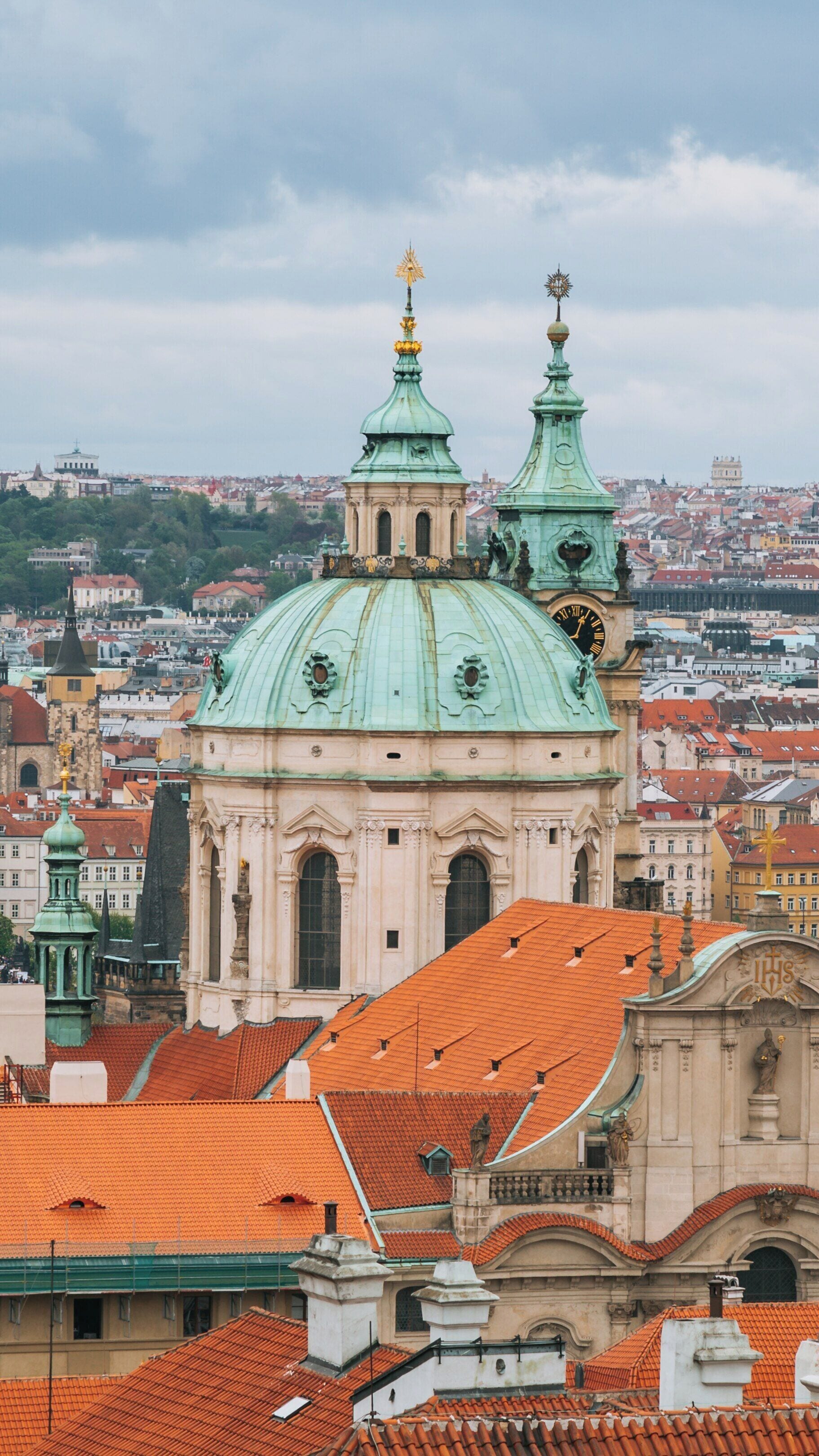 Prague Castle showcases stunning architectural details against the backdrop of the picturesque cityscape of Prague