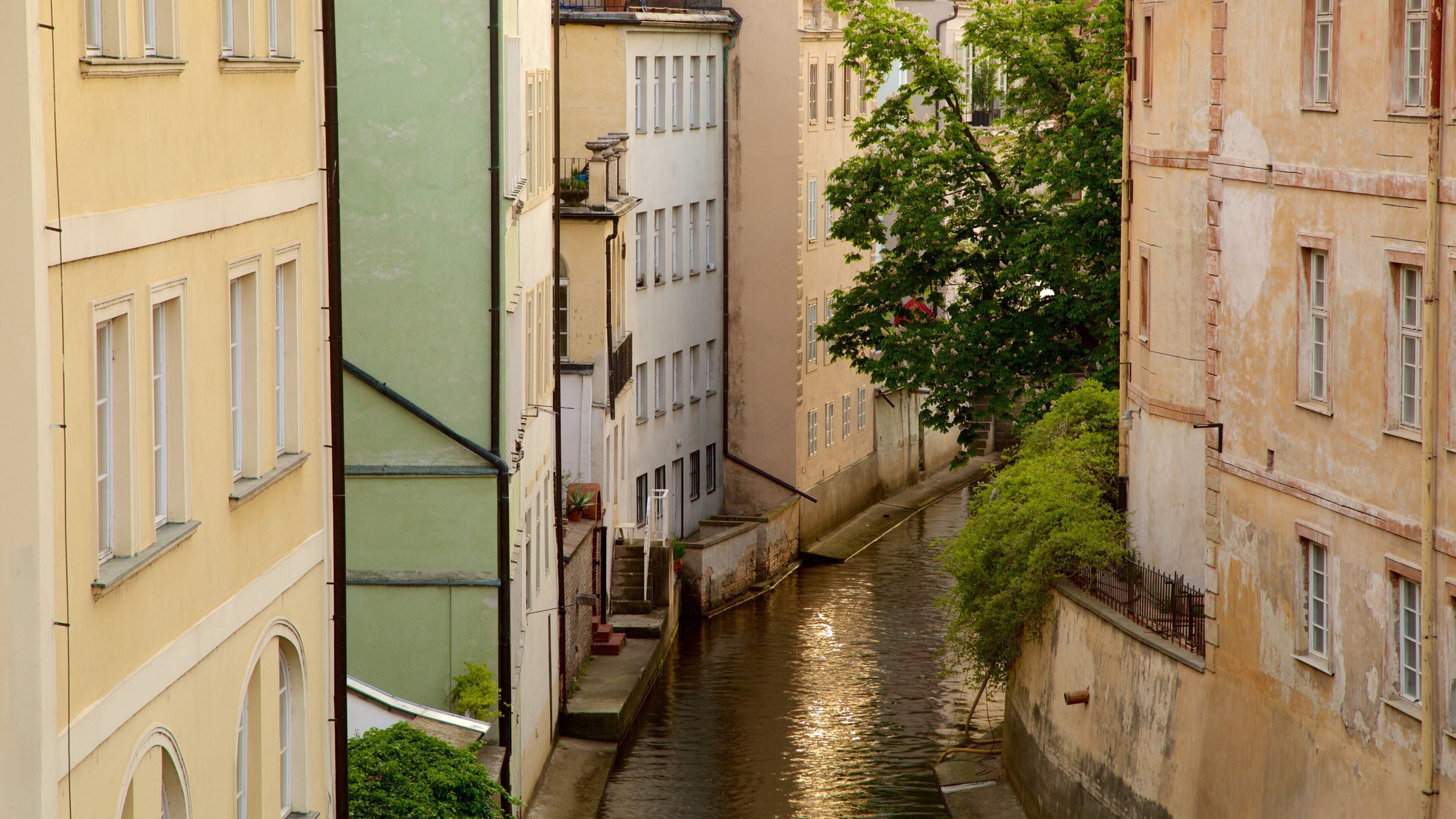 Prague showing a river or creek and a city