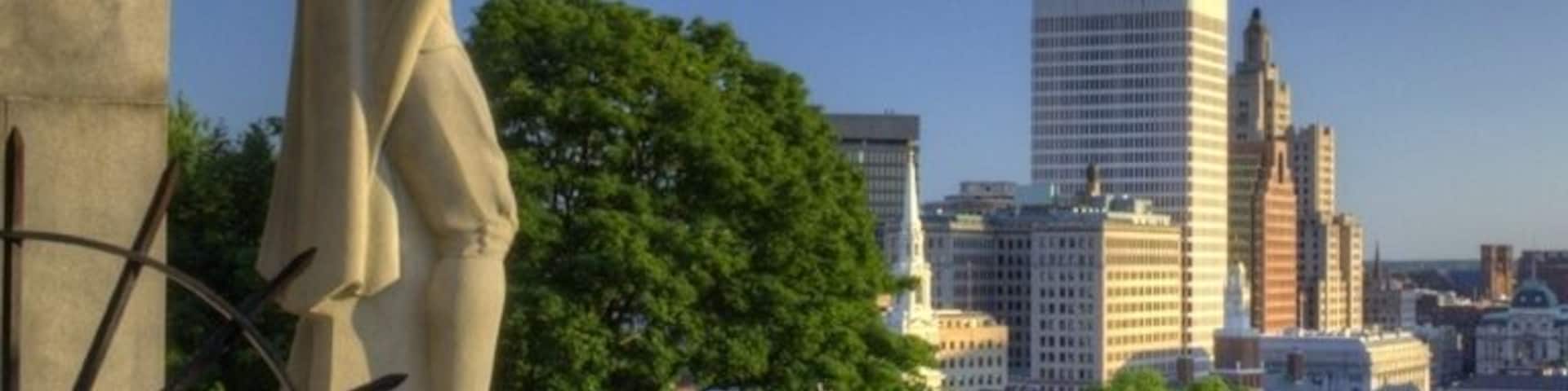 An iconic view of Roger Williams' statue overlooking the city that man founded, Providence