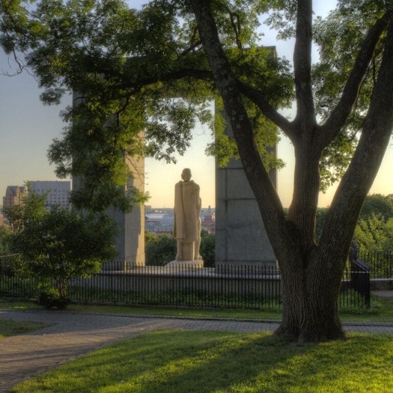 Late summer afternoon, near sunset at the statue of Roger Williams, the founder of Providence, Rhode Island where he believed in separation of church and state.  