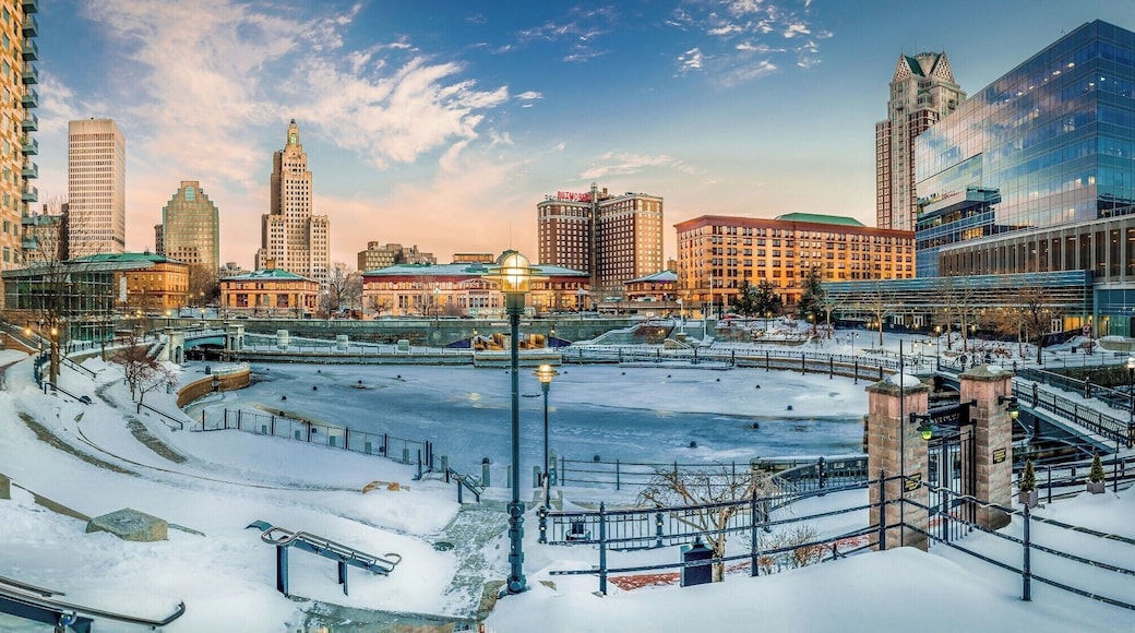 I left work the other night and I on the way to the car, I came across this beautiful sunset at Waterplace Park. All frozen over now.
Waterplace Park is an urban park situated along the Woonasquatucket River in downtown Providence, Rhode Island. Finished in 1994, Waterplace Park is connected to 3/4 mile of cobblestone-paved pedestrian walkways along the waterfront known as Riverwalk. Venice-styled Pedestrian bridges cross the river. Most of Riverwalk is below street level and automotive traffic. Waterplace Park and Riverwalk together are host to Providence's popular summertime Waterfire events, a series of bonfires lit on the river accompanied by Classical and World music.