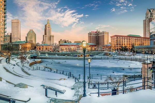 I left work the other night and I on the way to the car, I came across this beautiful sunset at Waterplace Park. All frozen over now.
Waterplace Park is an urban park situated along the Woonasquatucket River in downtown Providence, Rhode Island. Finished in 1994, Waterplace Park is connected to 3/4 mile of cobblestone-paved pedestrian walkways along the waterfront known as Riverwalk. Venice-styled Pedestrian bridges cross the river. Most of Riverwalk is below street level and automotive traffic. Waterplace Park and Riverwalk together are host to Providence's popular summertime Waterfire events, a series of bonfires lit on the river accompanied by Classical and World music.