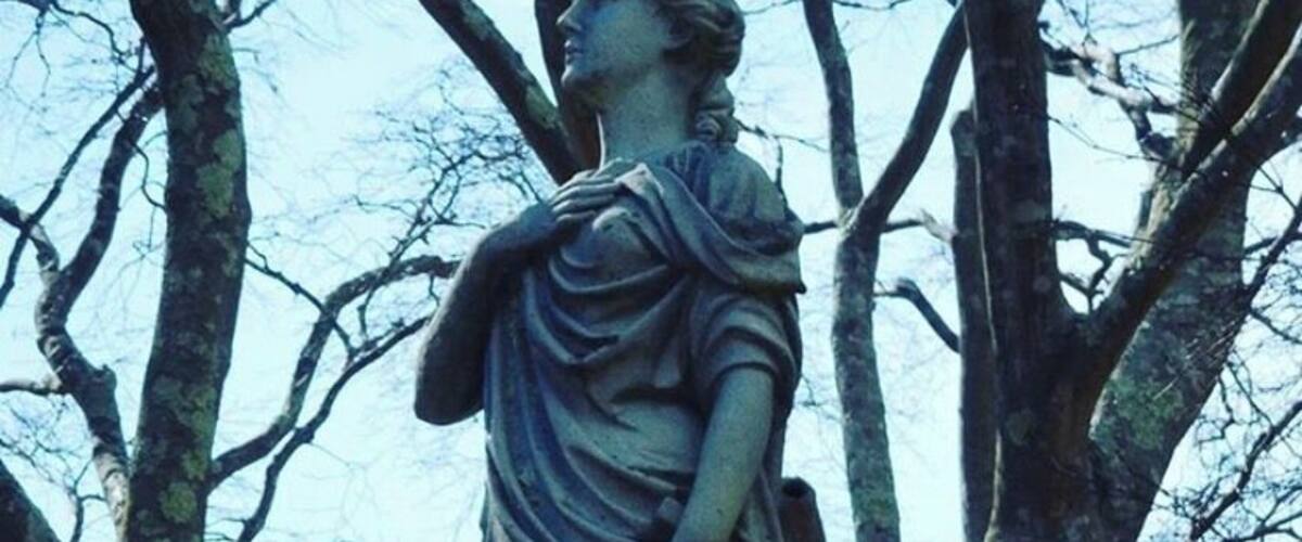 Mourning lady among the trees. Try the Halloween ghost walk.