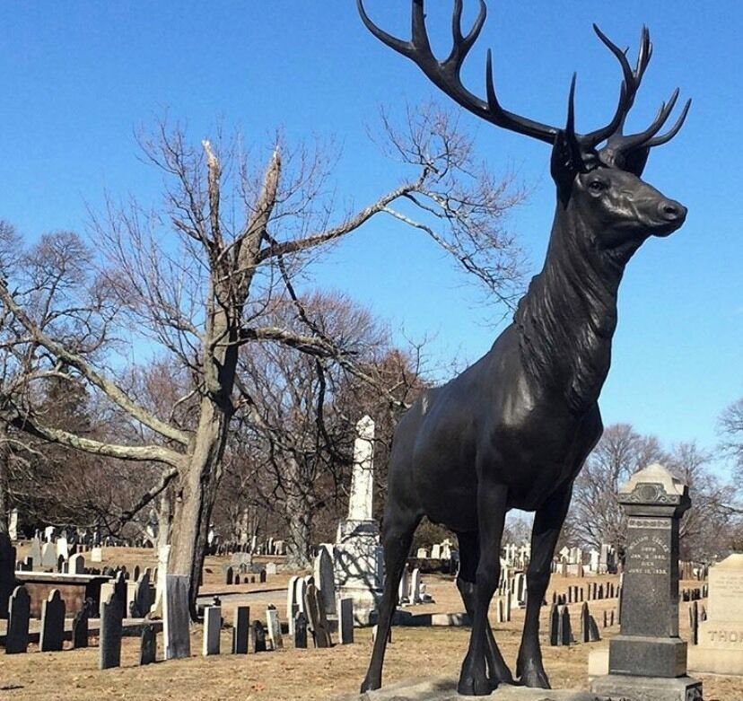Stag grave statue near the entrance