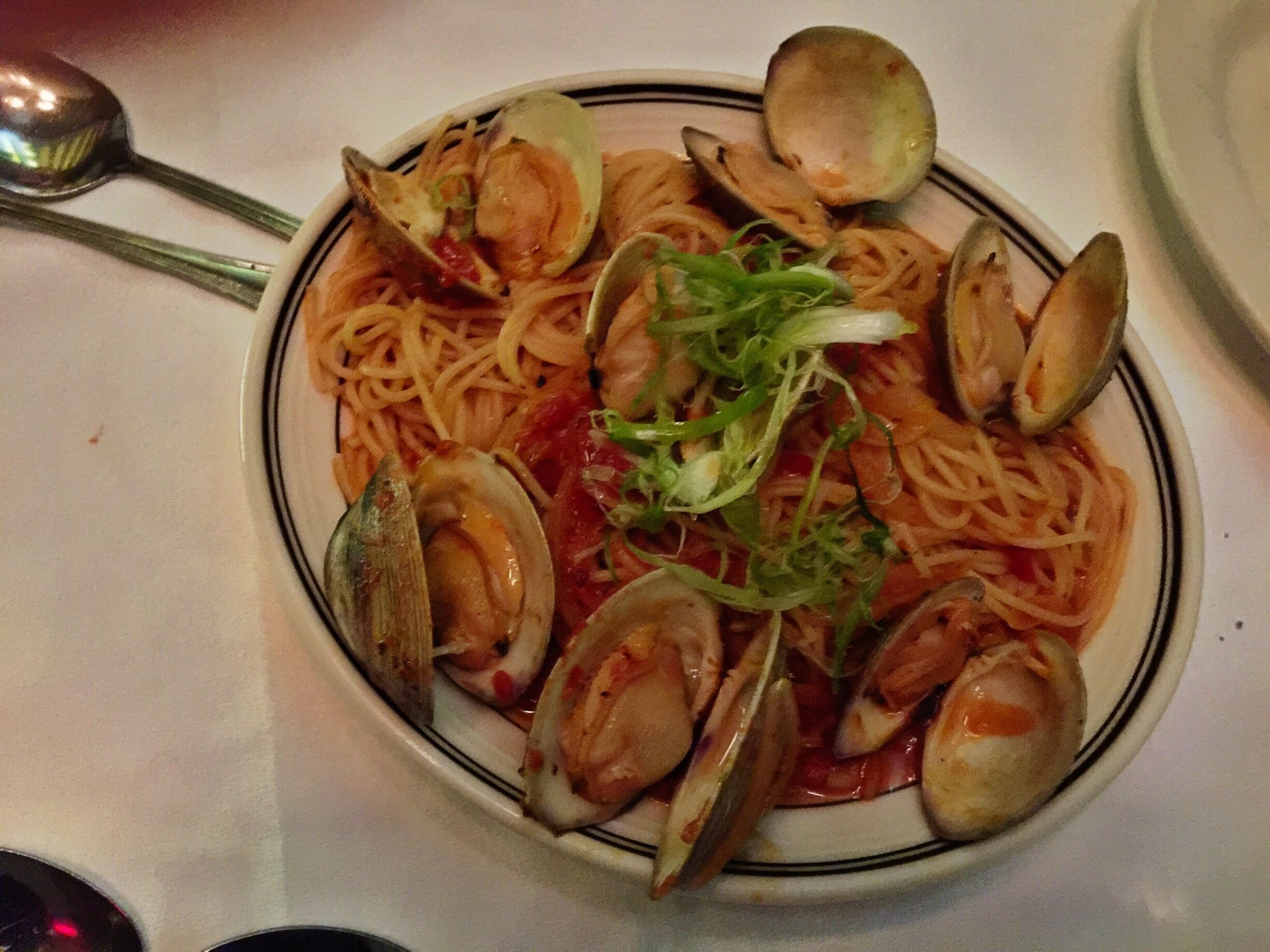 Freshly made spaghetti with clams in Arrabiata sauce. Oh so good. 