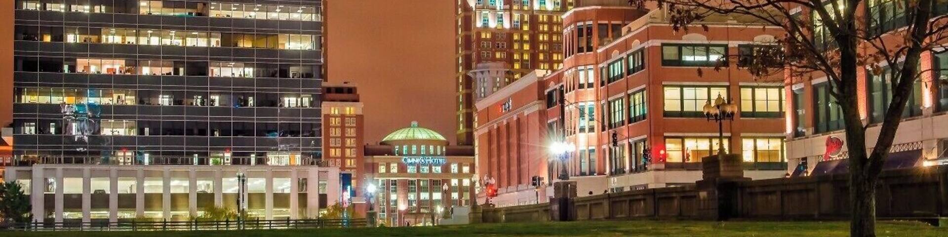 It's a Friday night, leaving the office on way to my car, I came across this view of downtown Providence.
I really like the drama in the sky, dark ominous, foreboding. And it stands in such stark contrast to the bright, well lit buildings.