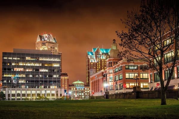 It's a Friday night, leaving the office on way to my car, I came across this view of downtown Providence.
I really like the drama in the sky, dark ominous, foreboding. And it stands in such stark contrast to the bright, well lit buildings.