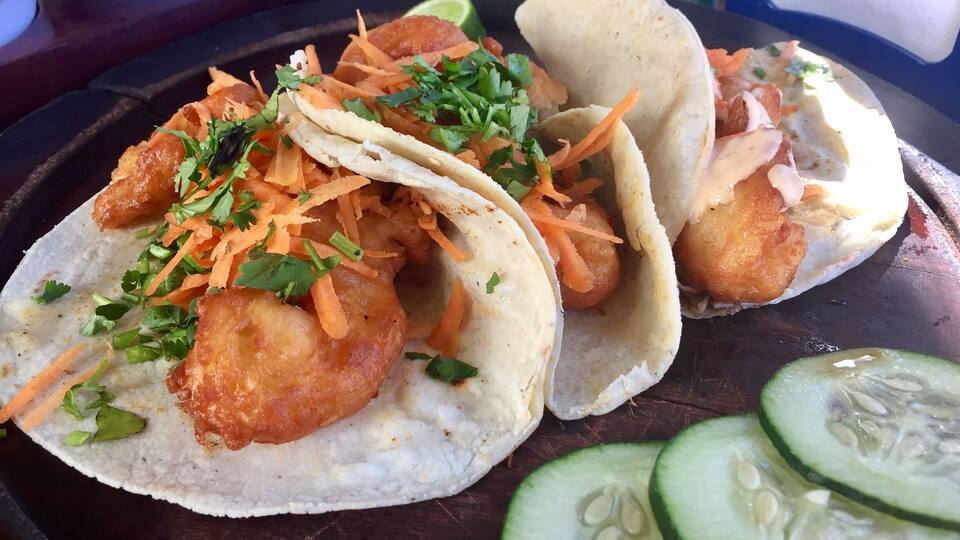 $1 USD each for the worlds best shrimp tacos!