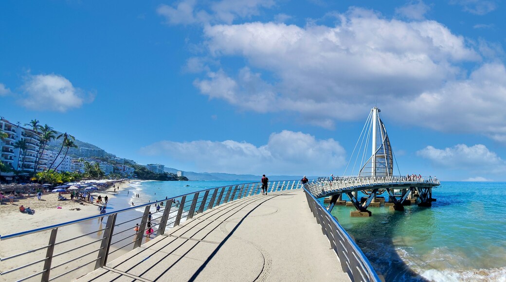 Playa De Los Muertos beach and pier close to famous Puerto Vallarta Malecon, the city largest public beach.