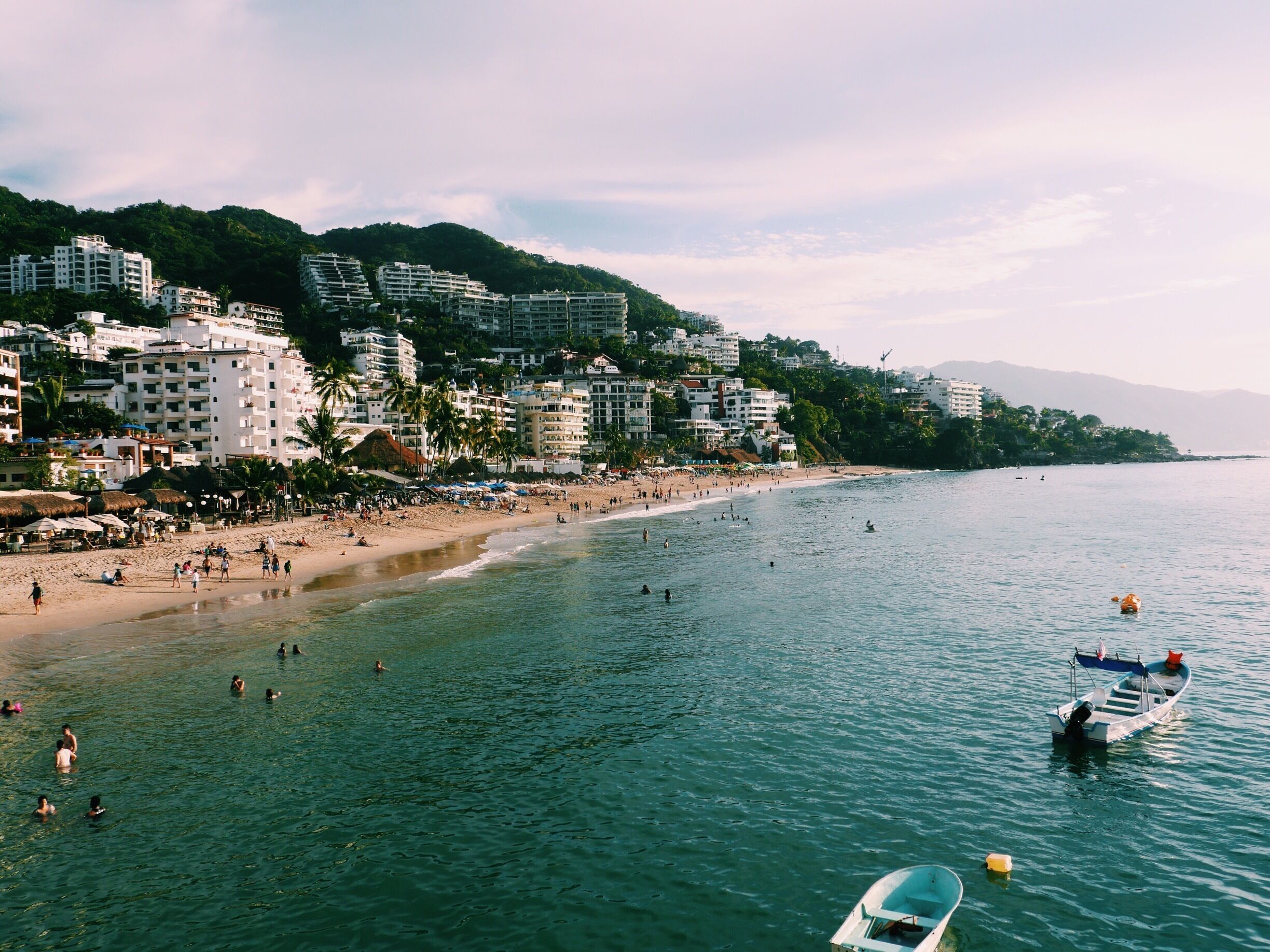 One of the main tourist beaches in Puerto Vallarta, Mexico, is Los Muertos a beach. It's always a party on this #beach, which is surrounded by restaurants, bars, shops, and beautiful mountains. 