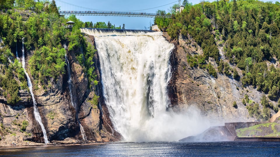 Montmorency Falls, large waterfall in Quebec city, Canada. Famous popular tourist destination in Quebec, tourism travel attraction.