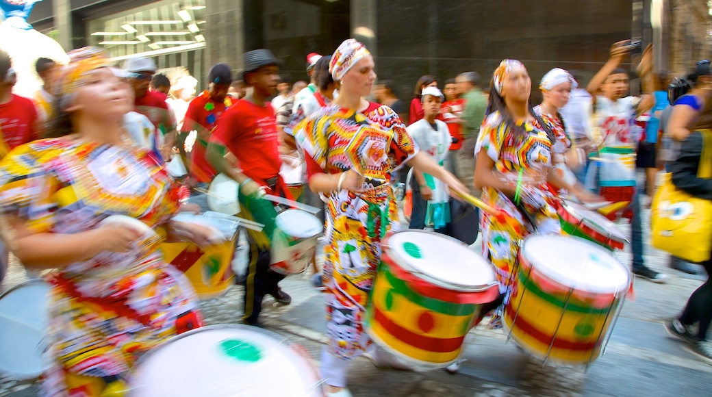 Sao Paulo showing street performance as well as a large group of people