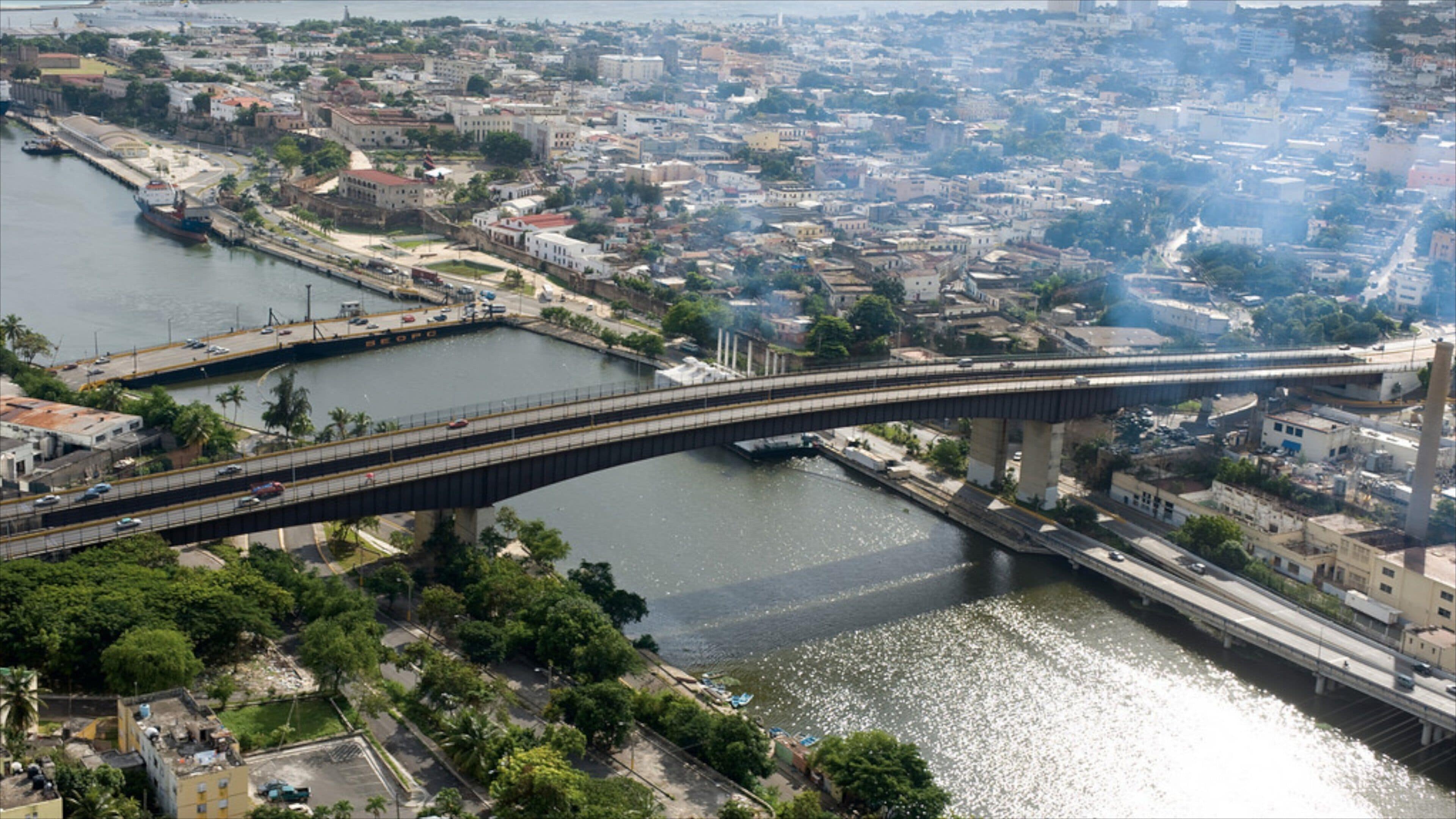 Santo Domingo featuring a river or creek, a city and a bridge