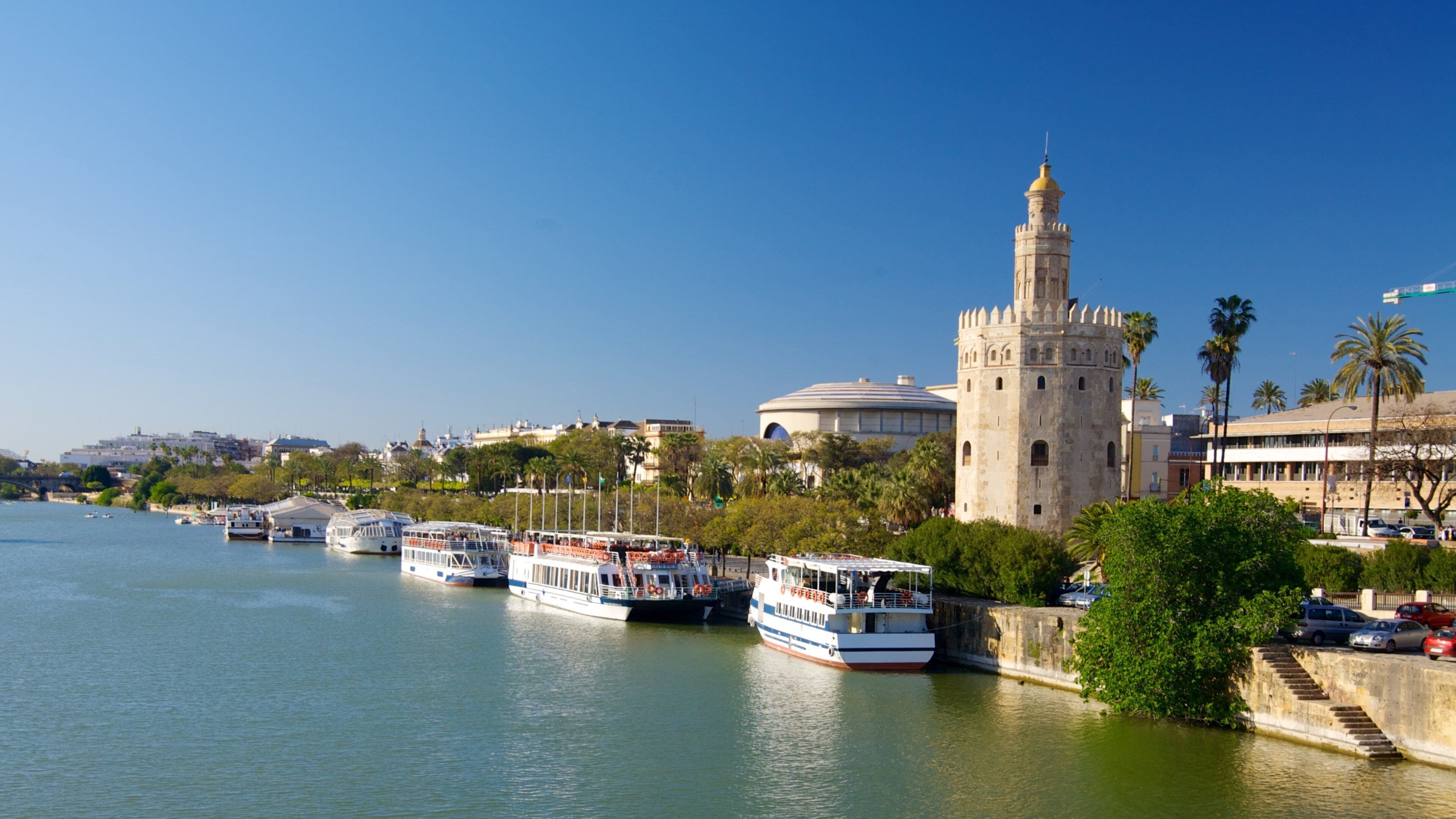 Province of Seville which includes a bay or harbor, a city and a marina