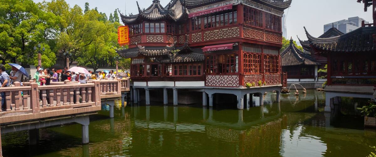 Shanghai which includes a lake or waterhole and heritage architecture
