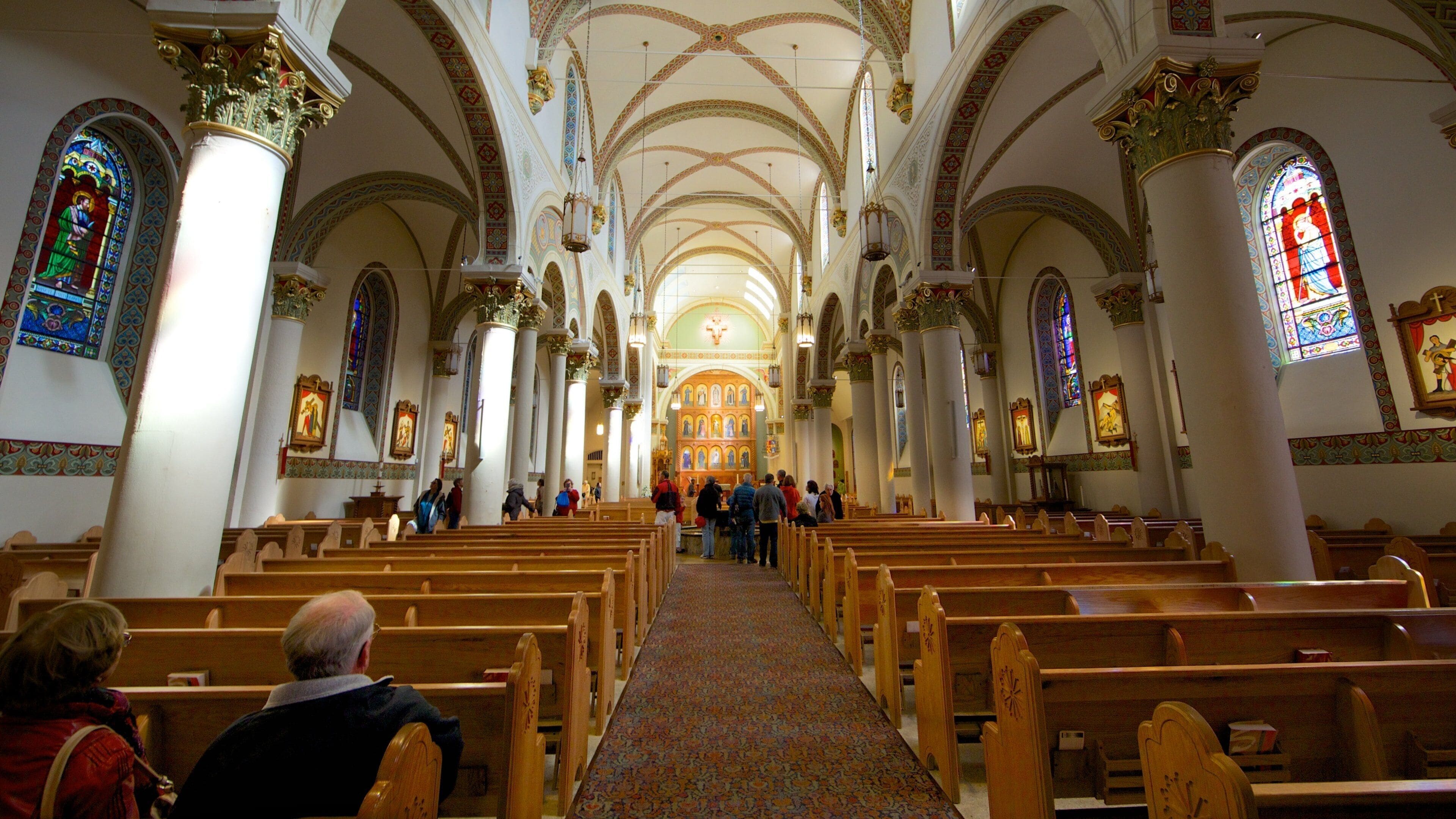 Santa Fe featuring interior views, religious elements and a church or cathedral