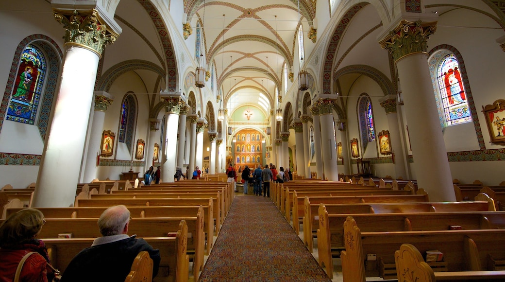 Santa Fe featuring interior views, religious elements and a church or cathedral