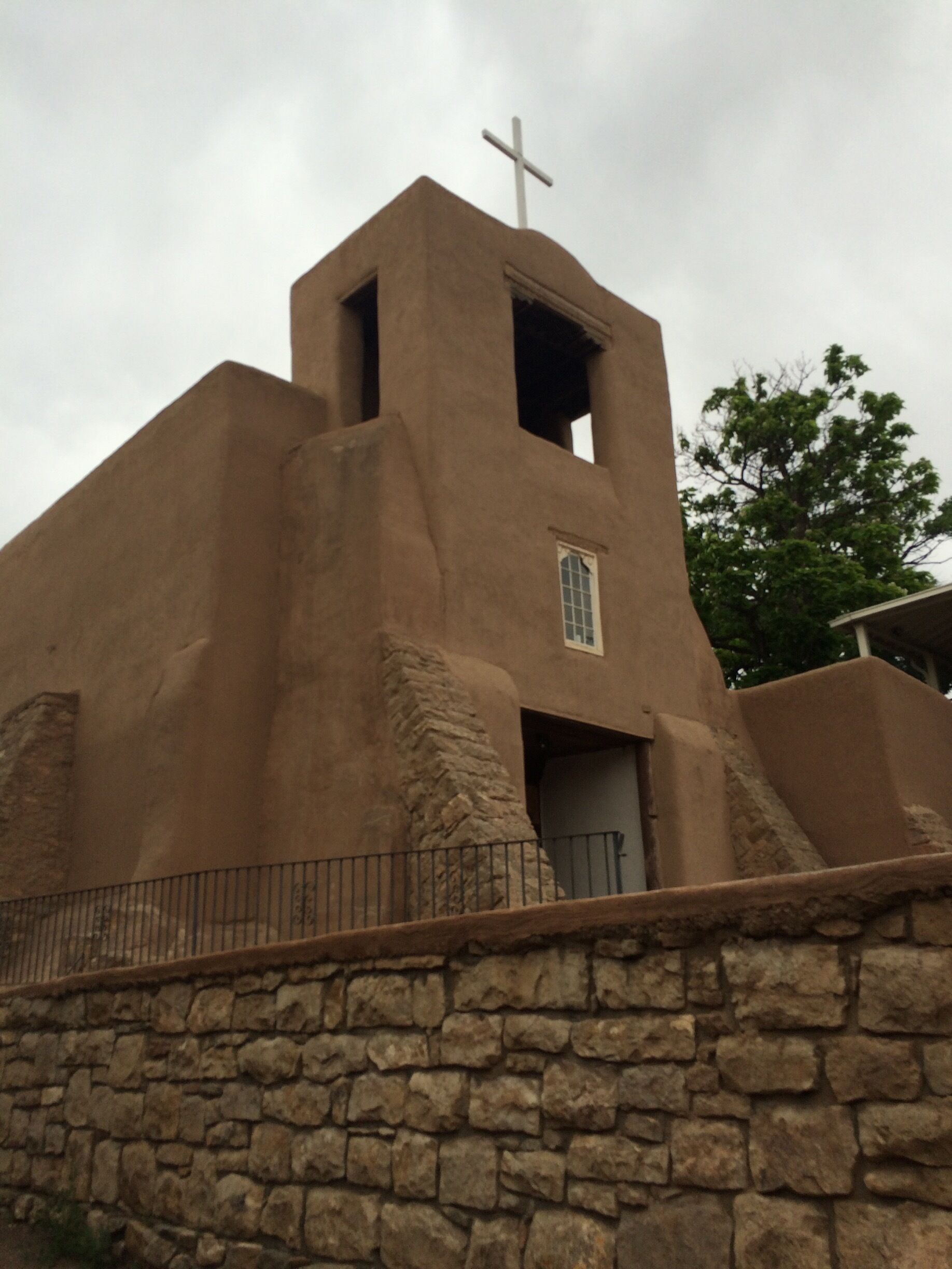 Oldest church near oldest house.