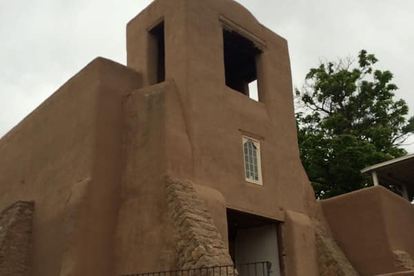 Oldest church near oldest house.