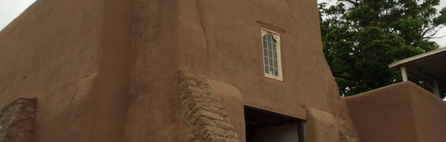 Oldest church near oldest house.