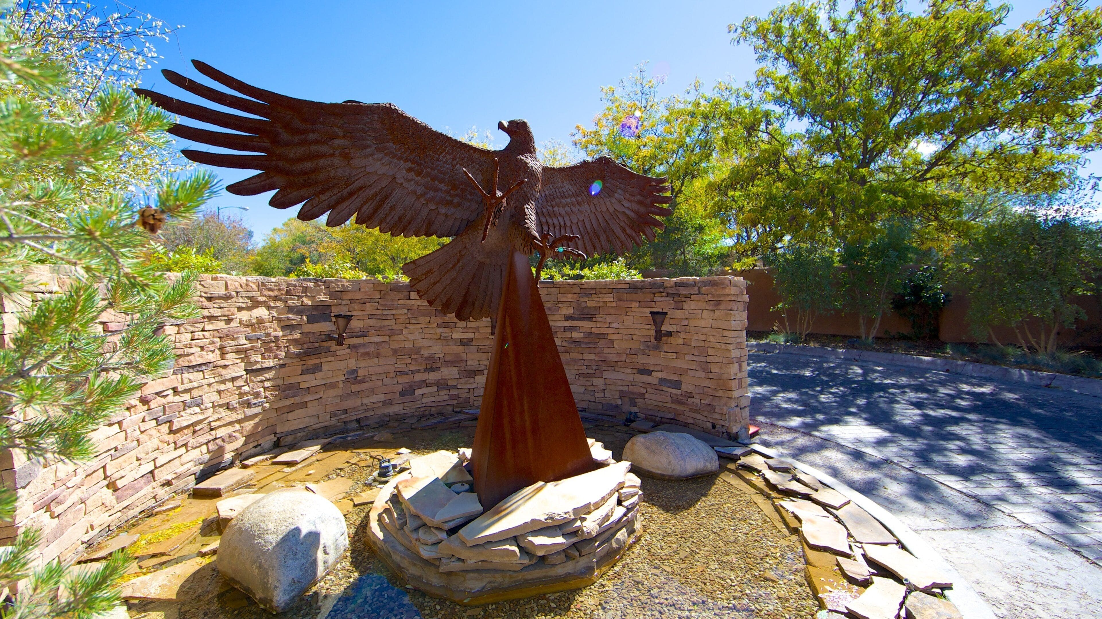 Santa Fe which includes a statue or sculpture, a garden and outdoor art