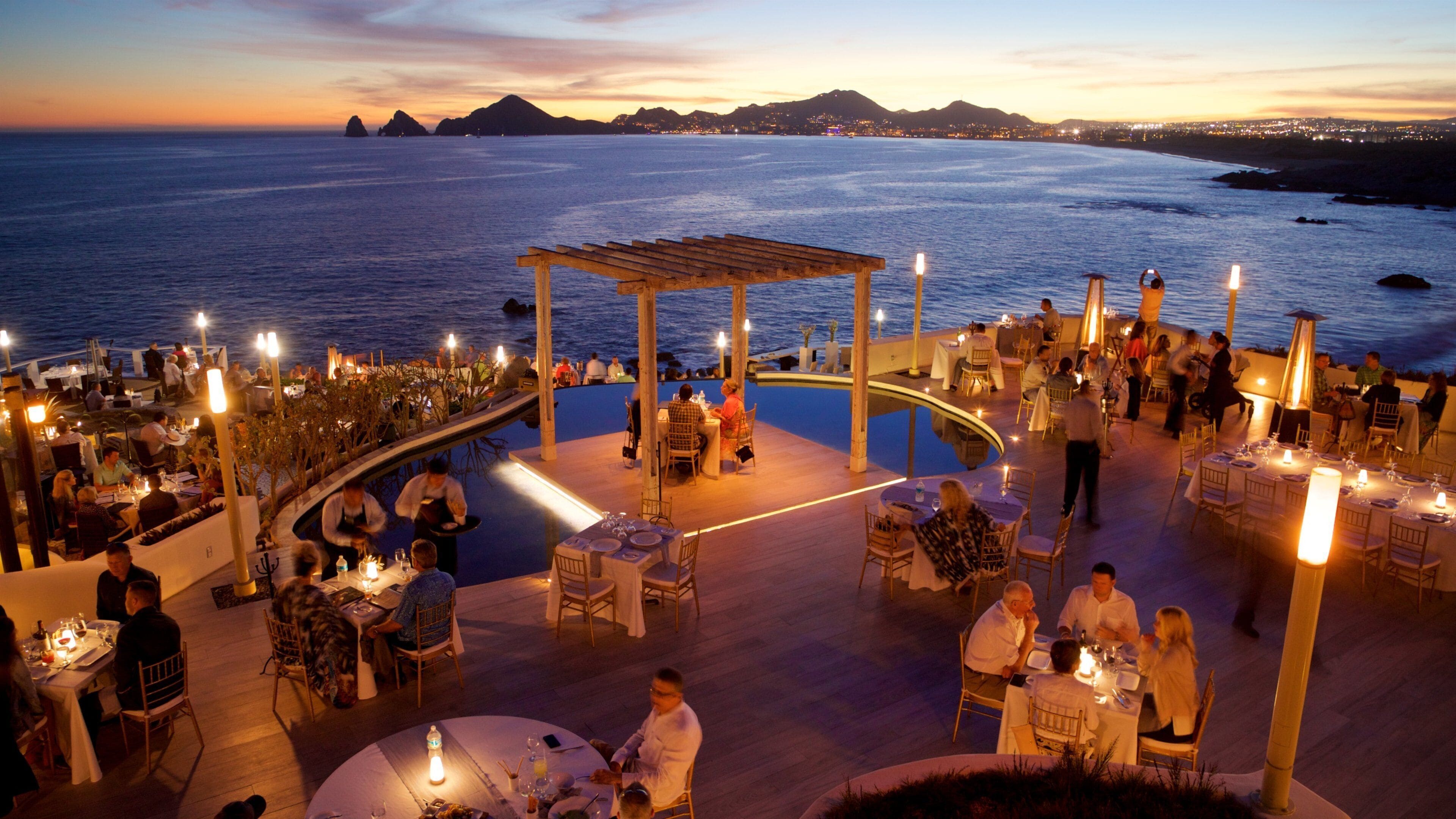 St Maarten and St Martin which includes outdoor eating, general coastal views and night scenes