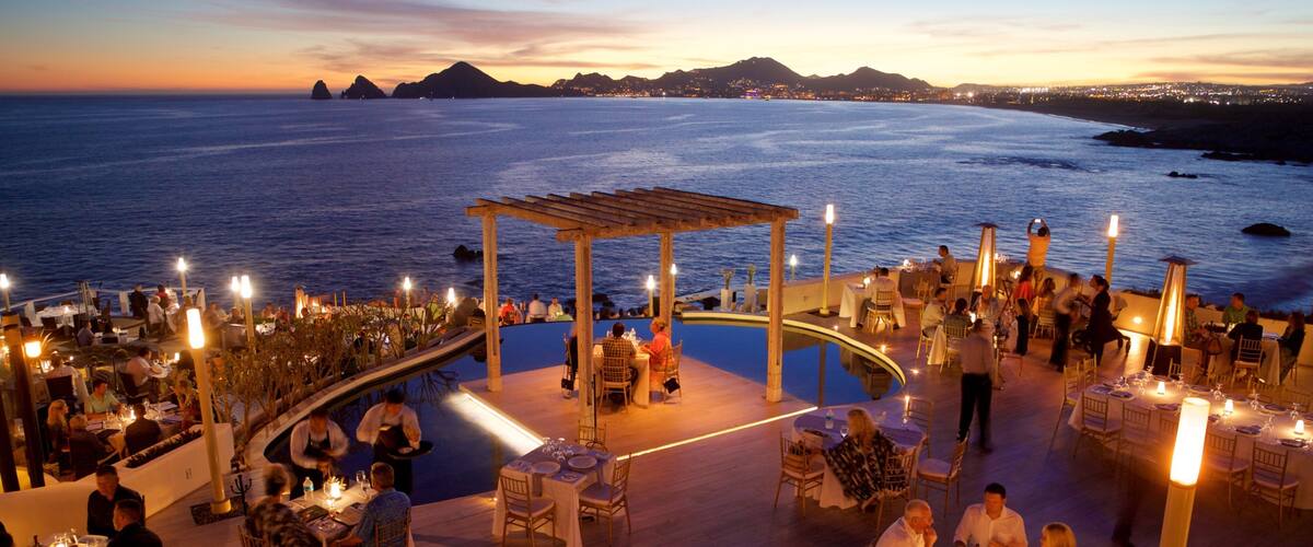 St Maarten and St Martin which includes outdoor eating, general coastal views and night scenes