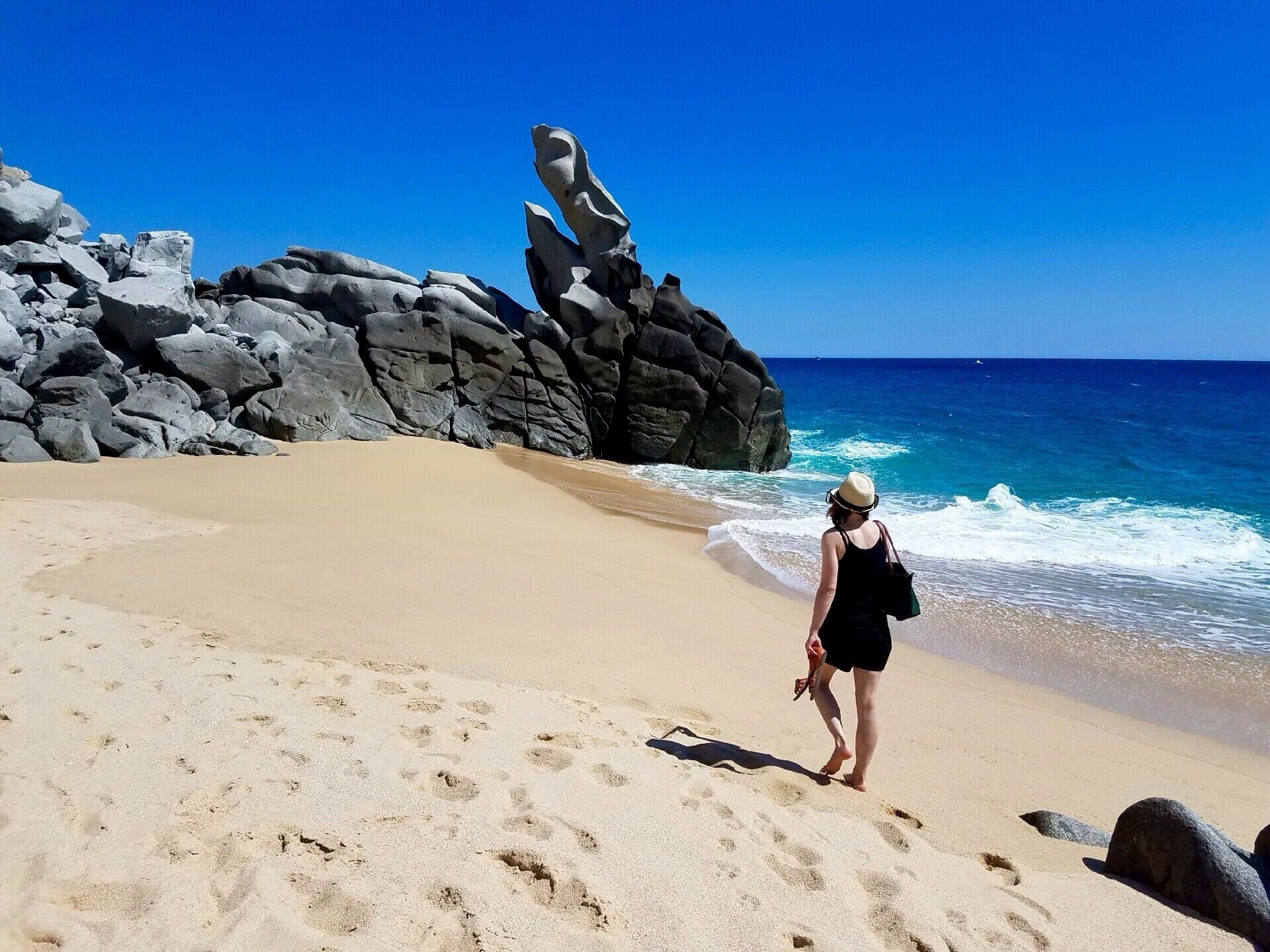 Waves and rocks at Pedregal beach. 