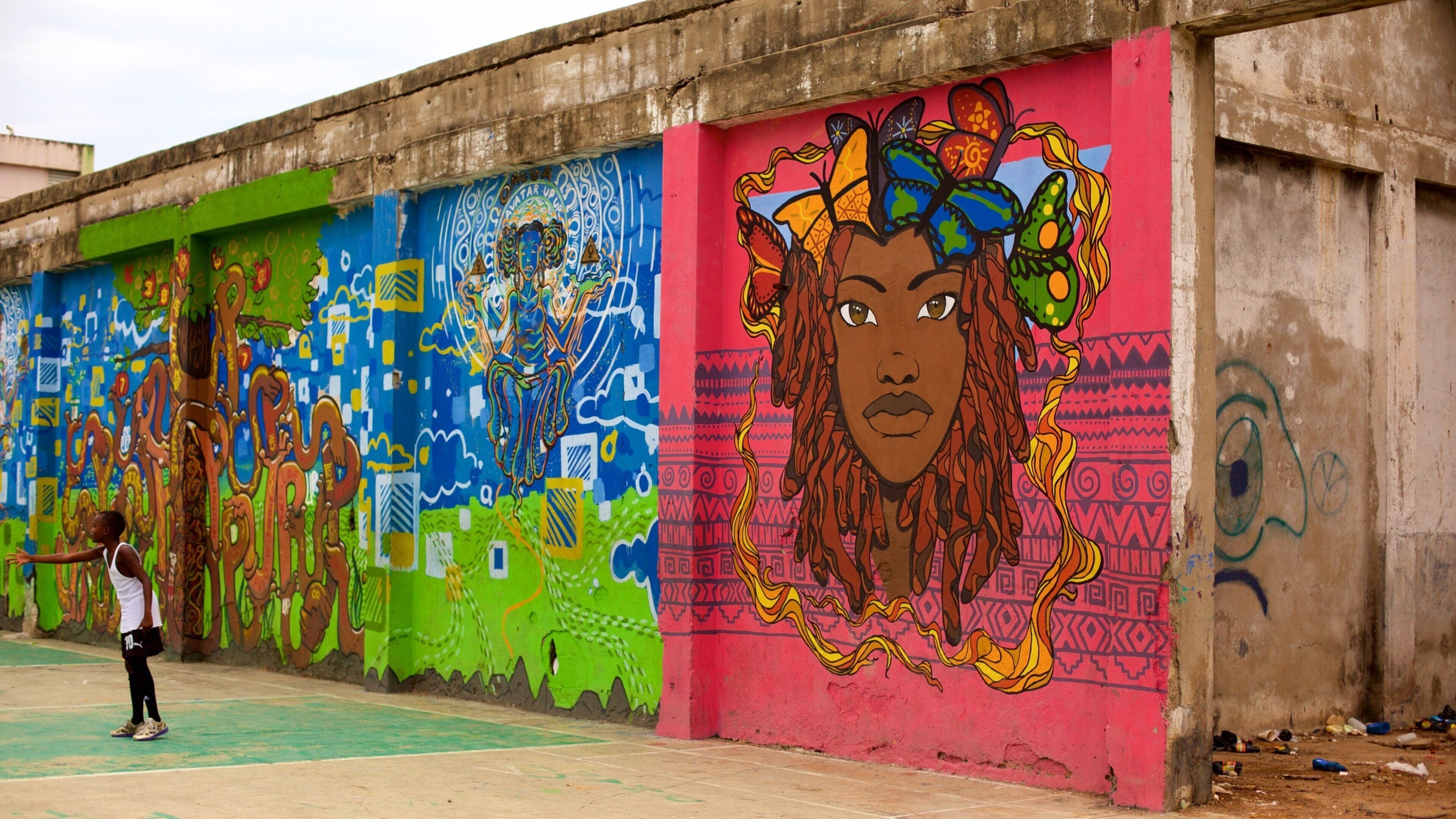 Kingston featuring outdoor art as well as an individual child