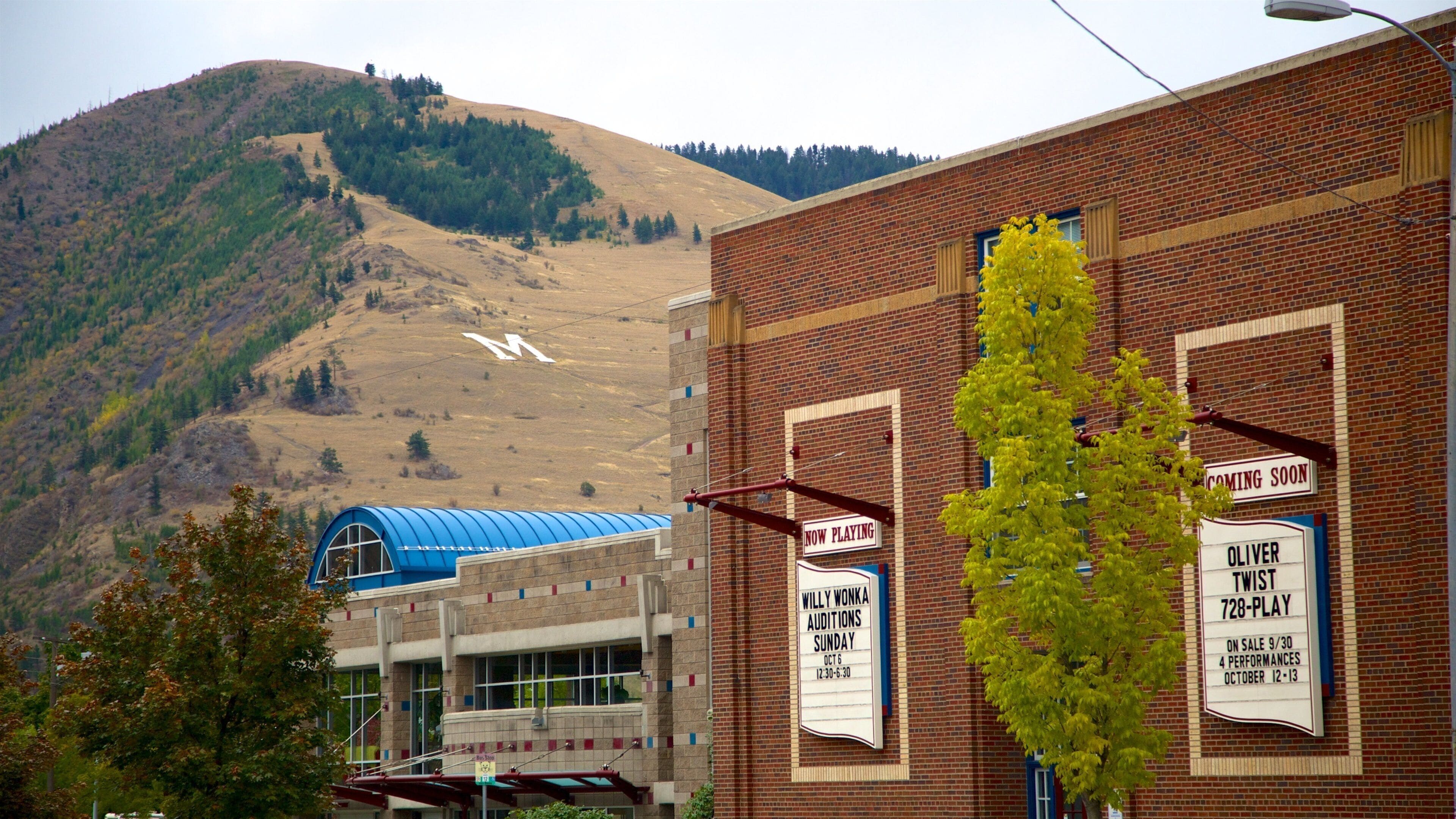 Missoula which includes a small town or village, theater scenes and mountains