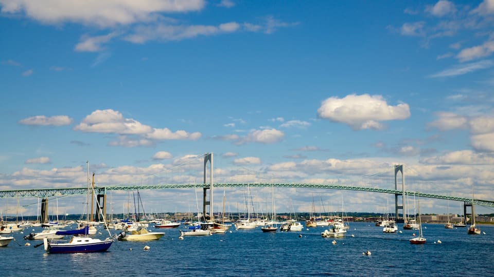 Newport showing a bridge, a bay or harbor and sailing