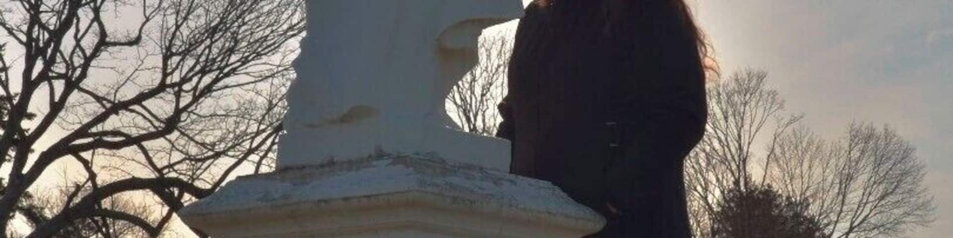 Touched by an angel.
Late in the day on a cold, exhausting, afternoon, I saw this miraculous sight of a woman looking for spiritual inspiration. Something tells me, she found it.