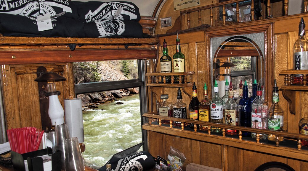 On our trip on the Durango & Silverton train, we managed to get the last two seats in the first class dining car. I was impressed with the intricate woodwork of the 1880's vintage coach, particularly the bar, with a view of the river out the window.
#railroad
#train
#historic_rail_journeys