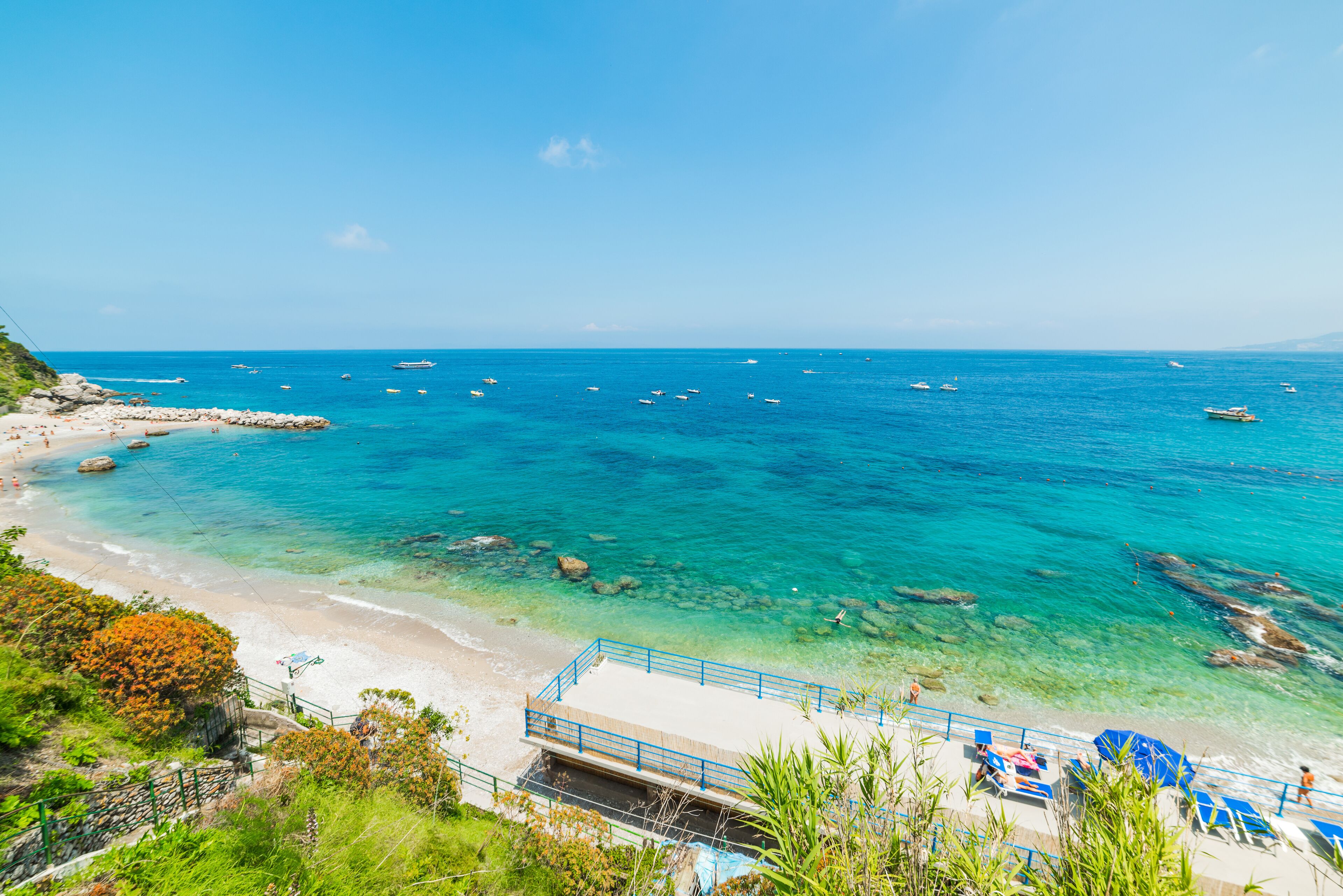 Turquoise water in world famous Marina Grande beach in Capri island, Italy