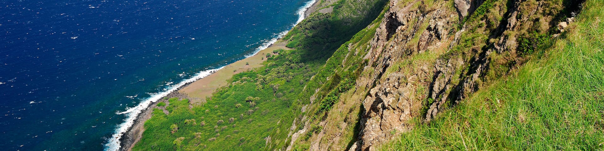 Sheer Sea cliffs of Kalaupapa leper sanctuary Molokai Hawaii
