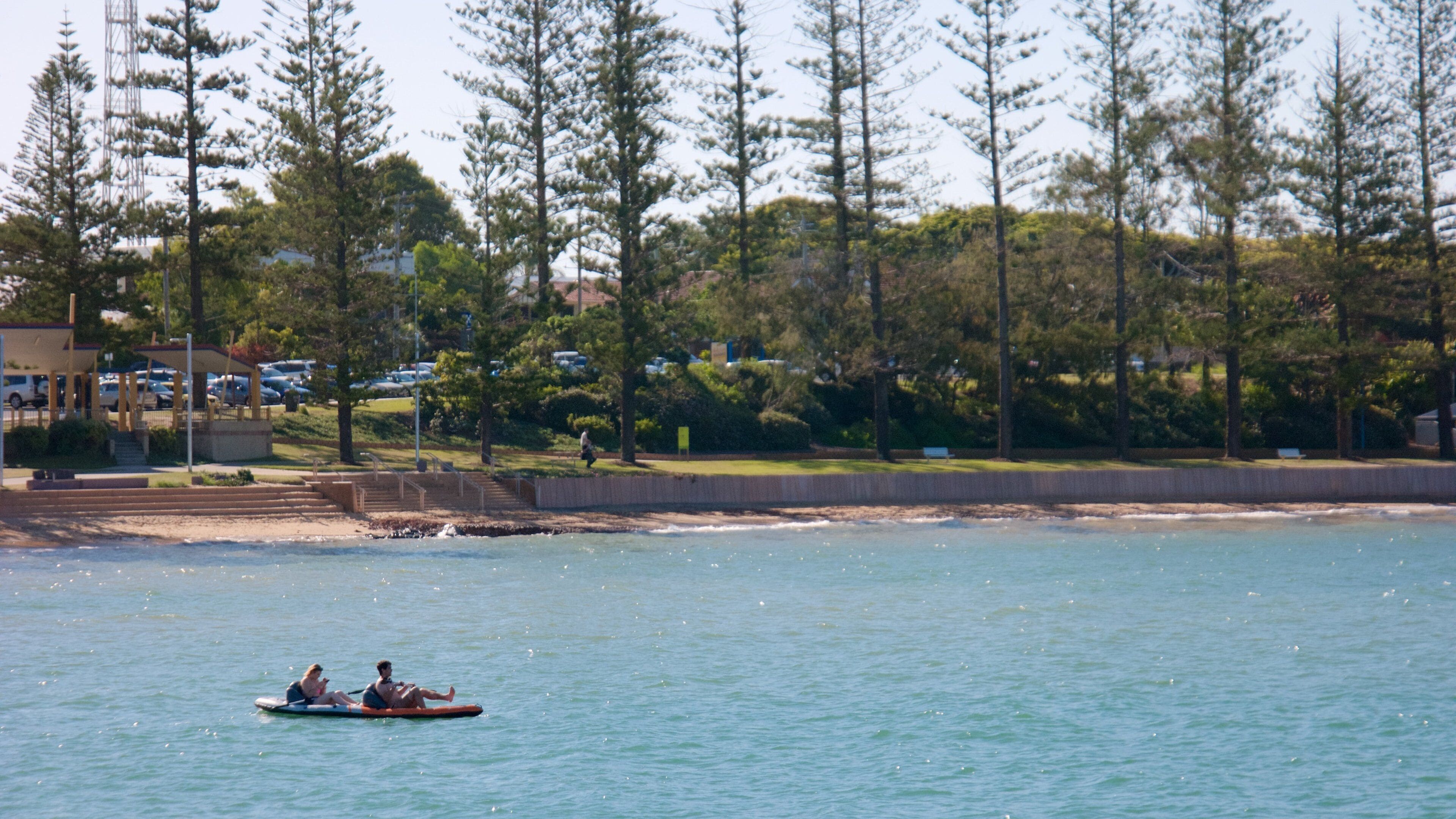 Redcliffe featuring kayaking or canoeing and a beach as well as a small group of people