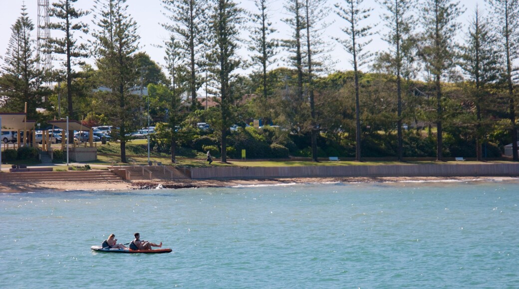 Redcliffe featuring kayaking or canoeing and a beach as well as a small group of people