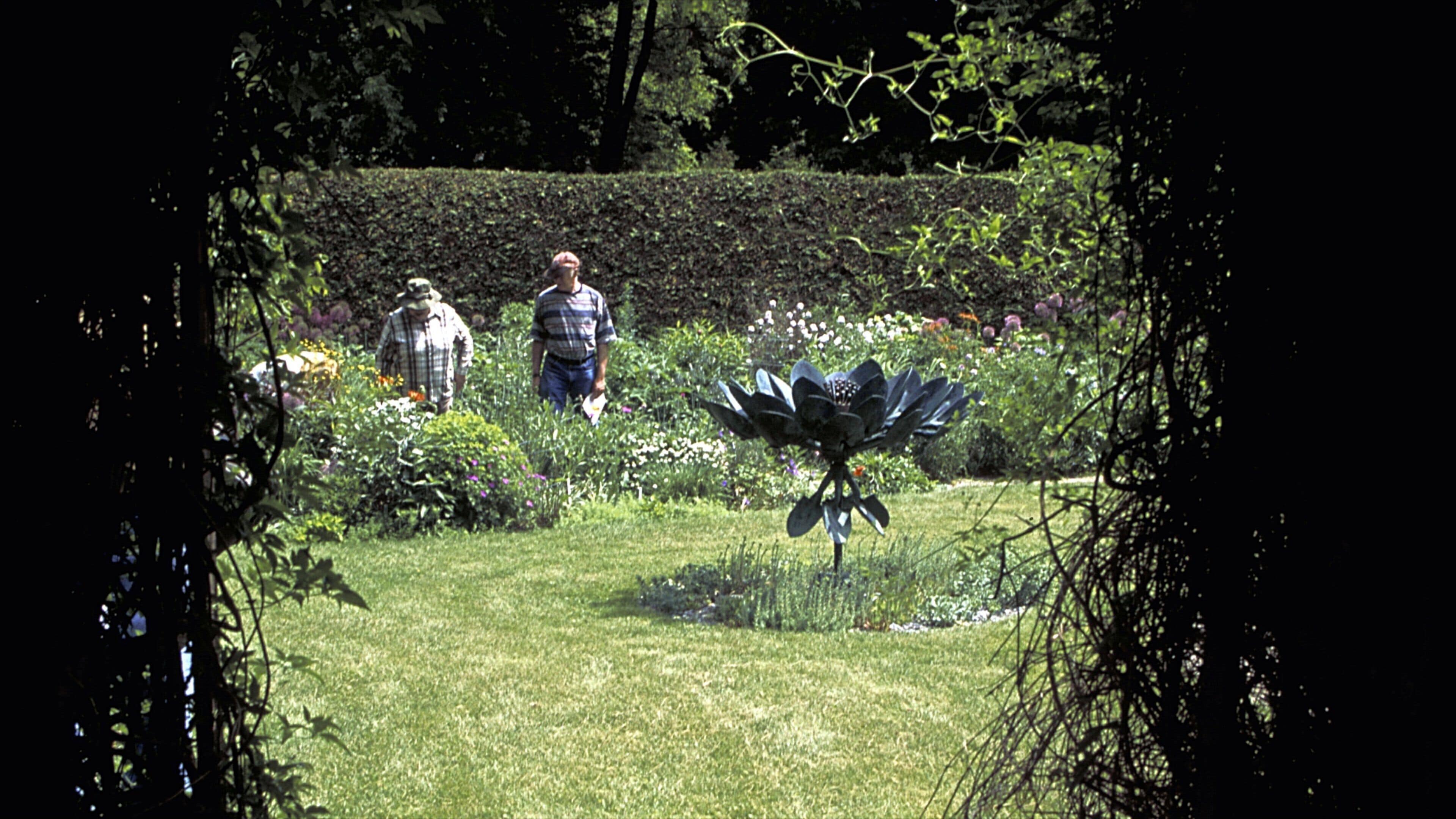 Unionville showing tranquil scenes and a garden as well as a small group of people