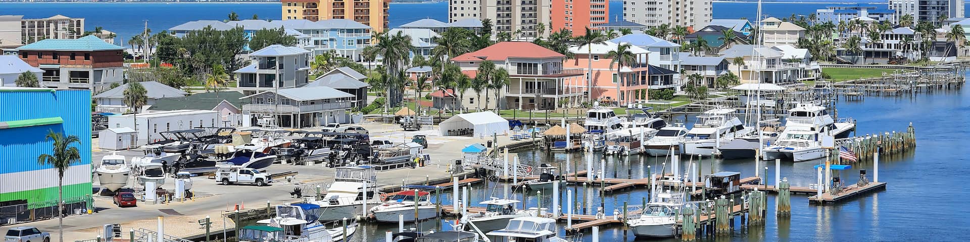 Aeral view of Fort Myers Beach downtown skyline and the Mantanza Pass Waterway and the Gulf.