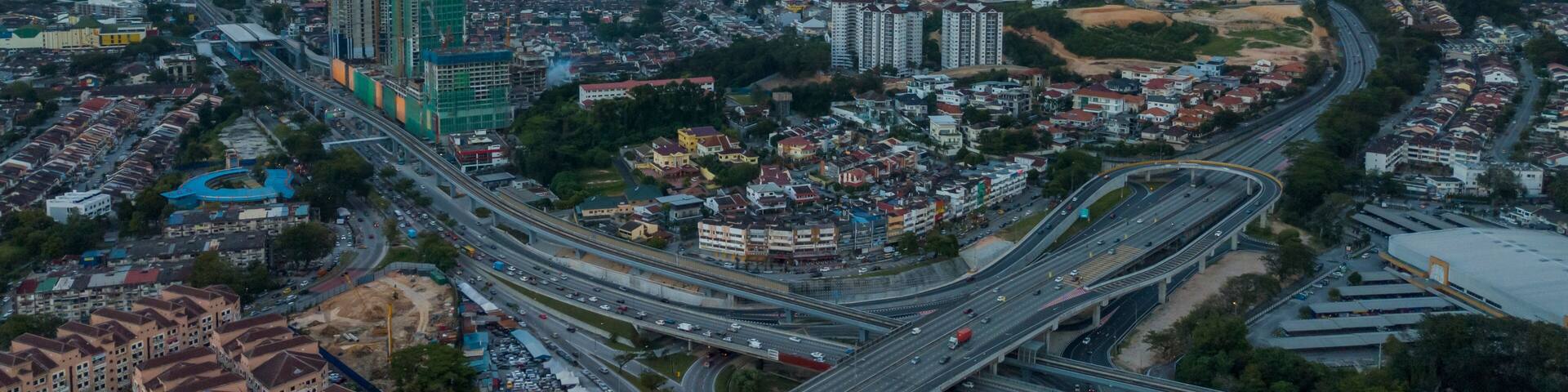 Aerial view of KL City suburb showing road and rail interchange