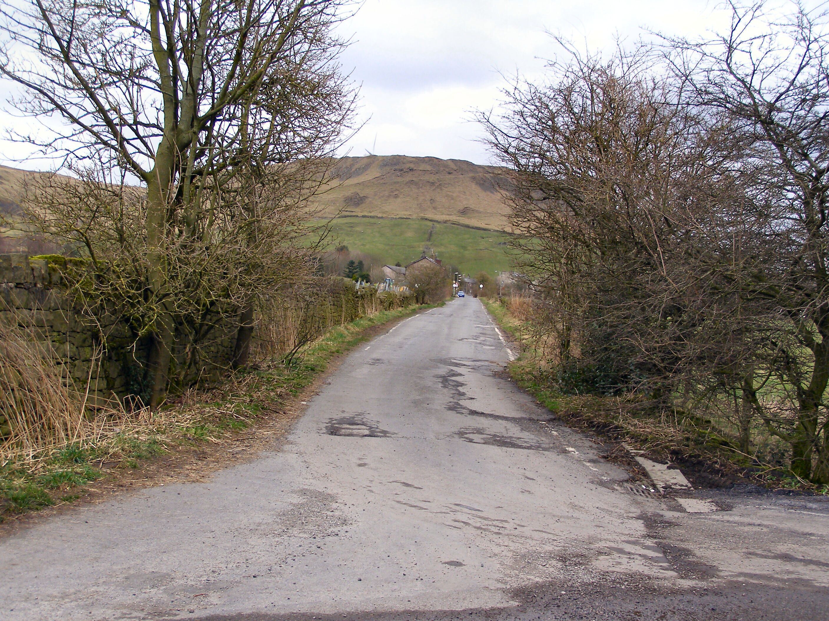Bleakholt Road Looking up Bleakholt Road towards Whittle Hill.