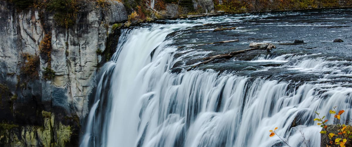 A waterfall cascading over a rocky cliff.