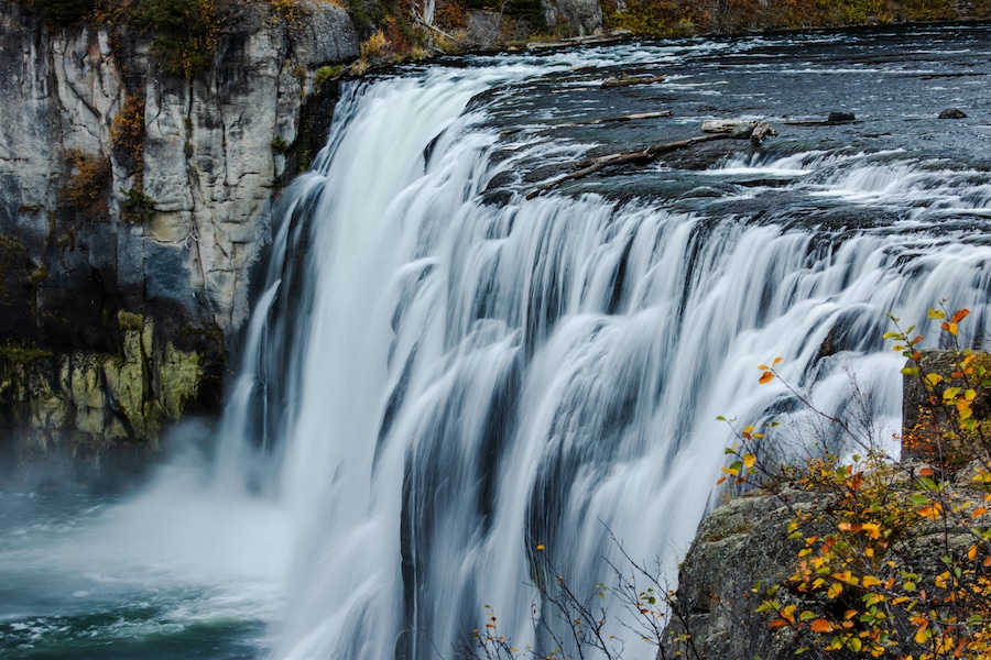 A waterfall cascading over a rocky cliff.